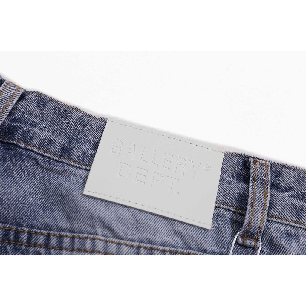 Gallery Dept Jeans with Artistic Ink Splatter and Distressed Flares